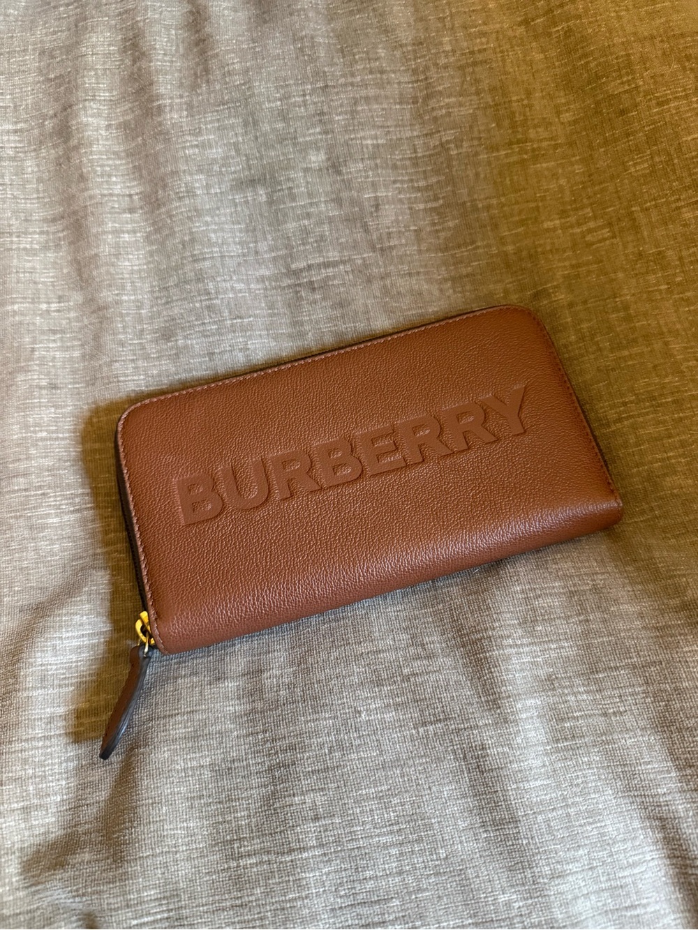 Burberry Embossed Logo Zip Wallet in Cognac Brown
